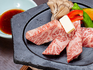 Akita Nishiki beef grilled on a stone plate